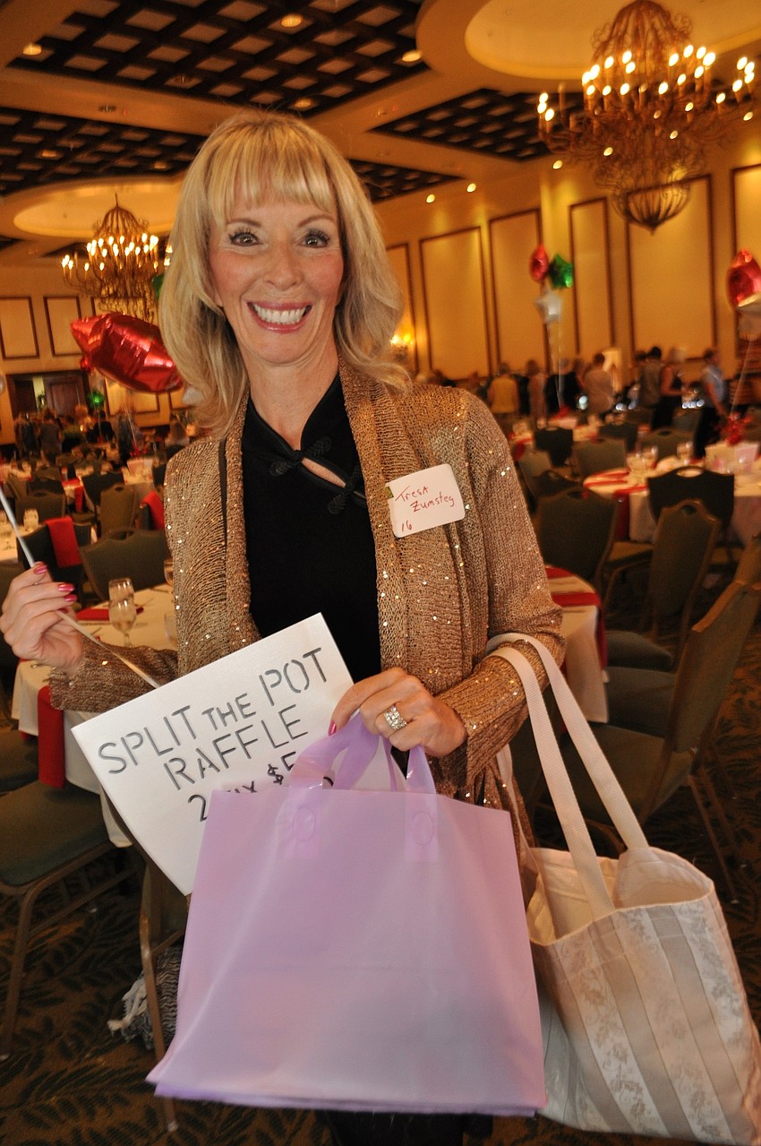Tresa Zumsteg promotes the raffle.