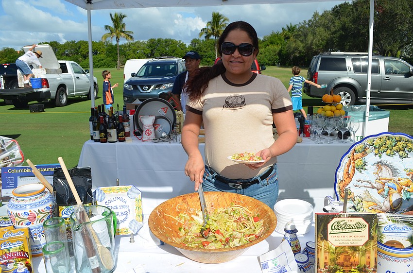 Arelis Felipe serves Columbia Restaurantâ€™s famous 1905 salad