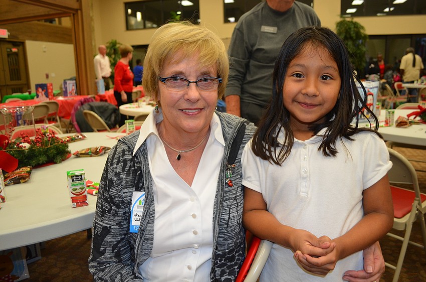 Reading buddies Maureen Williamson and Anali Bernachi