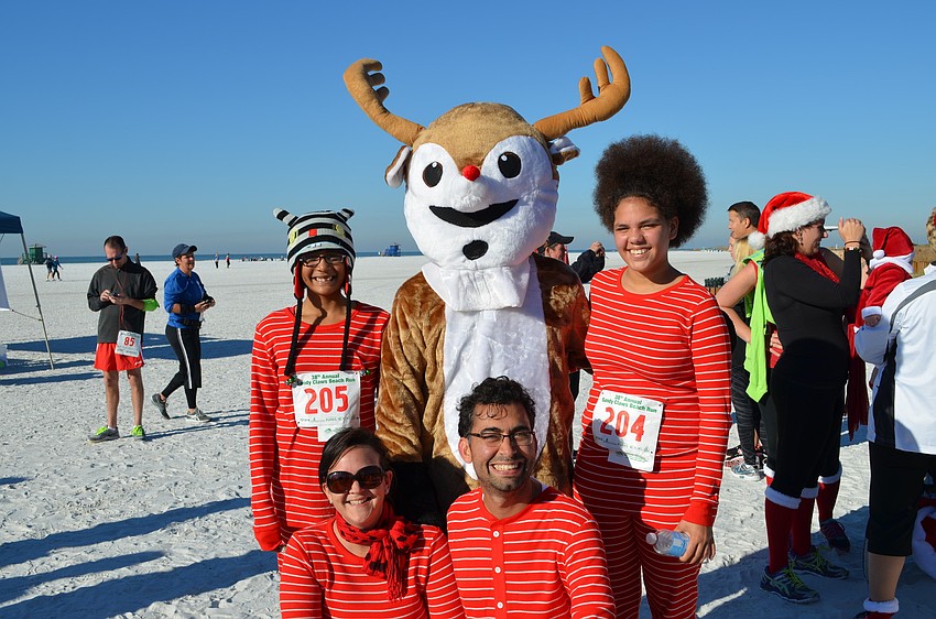 Mya Perez, Lily Perez, Christina Pitchford and Krishen Greenwell wear matching pajamas for the 5K.