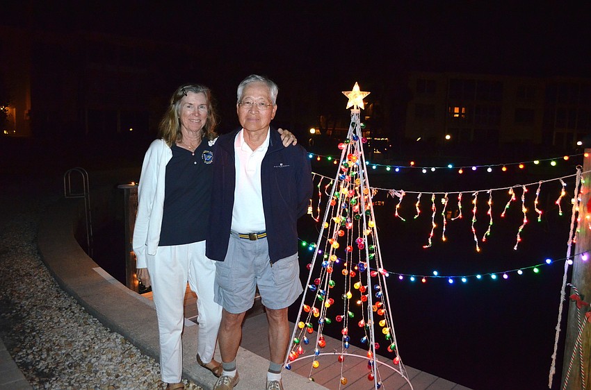 Mary and Yoshito Kimura in front of their dock