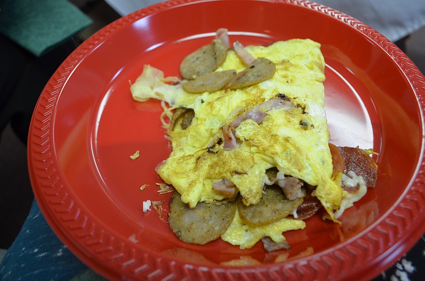 Guests ordered custom-made omelets with a variety of toppings.