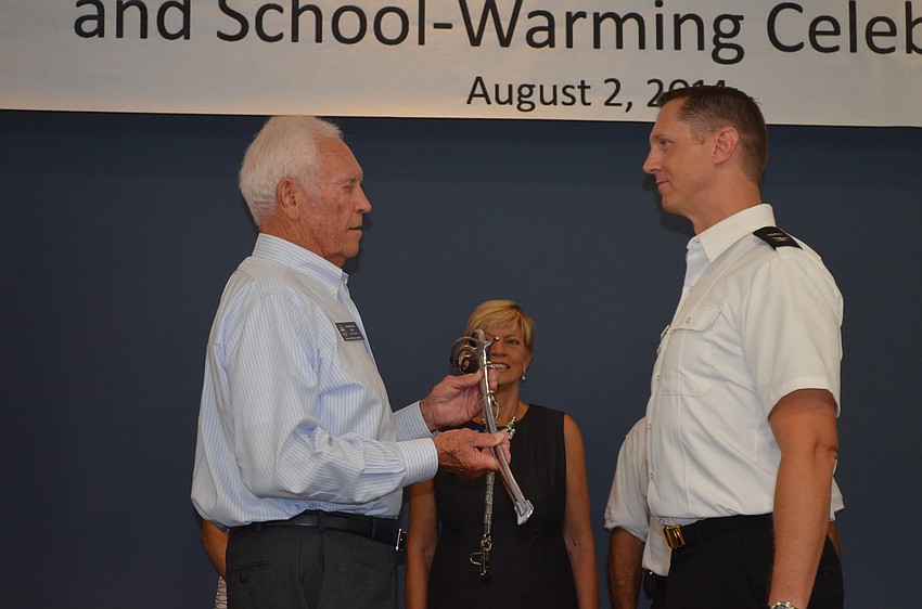Frederick Jones inducts SMA-Colonel and Head of School SMA Prep Phillip Eddy.