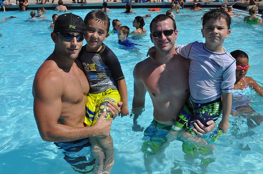 Â Sean and Brenden Gast splash around with Matt and Jack Brock.