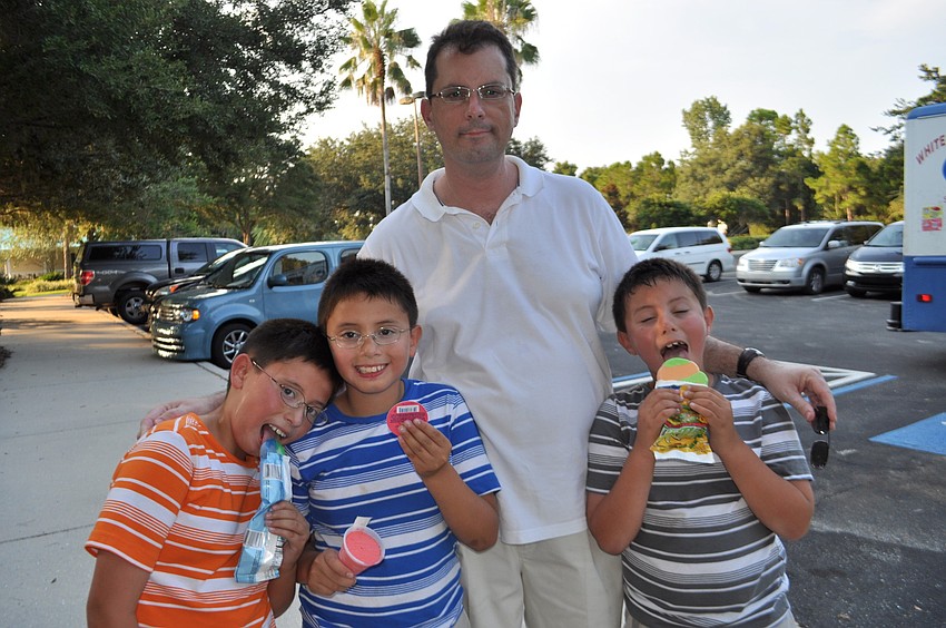 Gabriel, Nathan, Ben and Zachary Alpert enjoy ice cream.