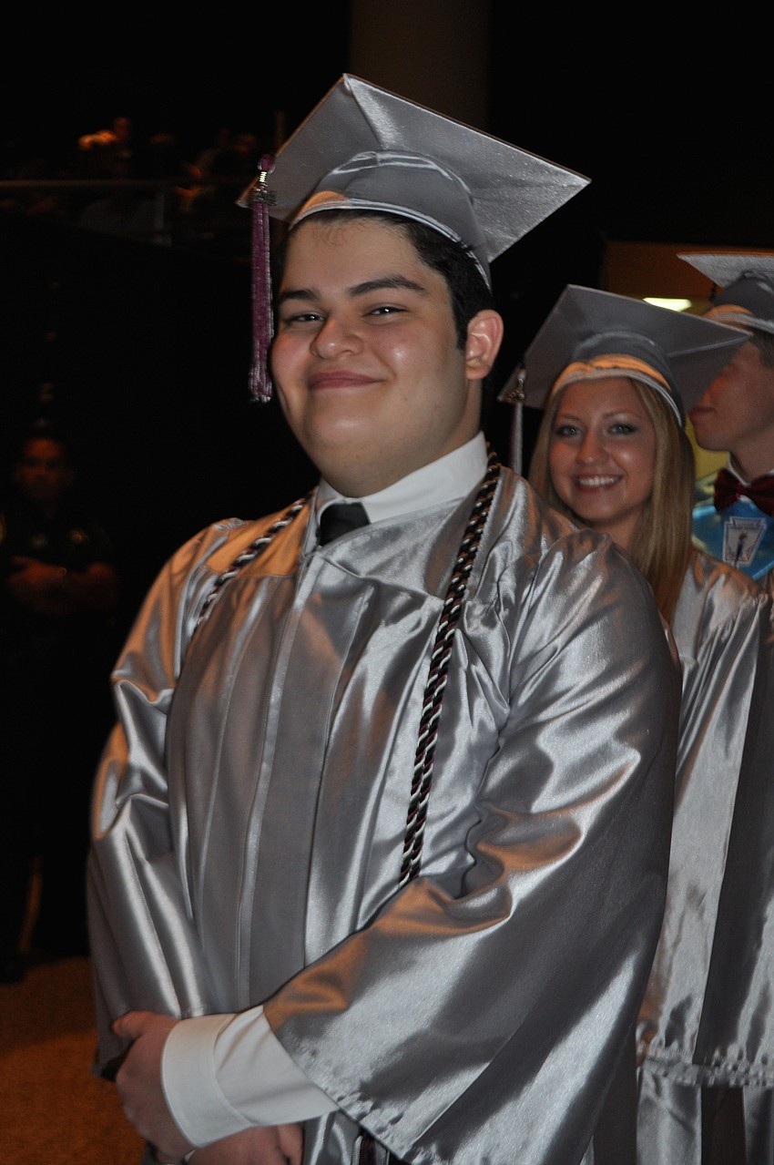 Josh Aponte walks in to the auditorium.