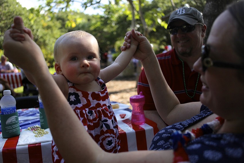Teagan Portale, 8 months, plays with her mom, Maggie Mooney-Portale