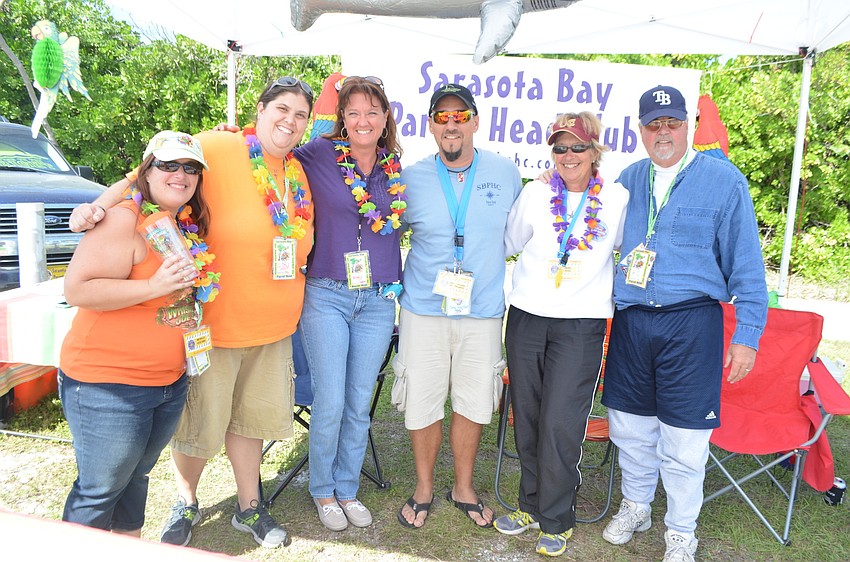 Michele Guilford, Lori Burkholder, Mary McClure, Mike Fontaine, RC Ryan and Mary Ryan of the Sarasota Bay Parrot Head Club