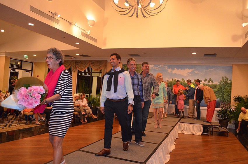 The 13 models take a final walk on stage