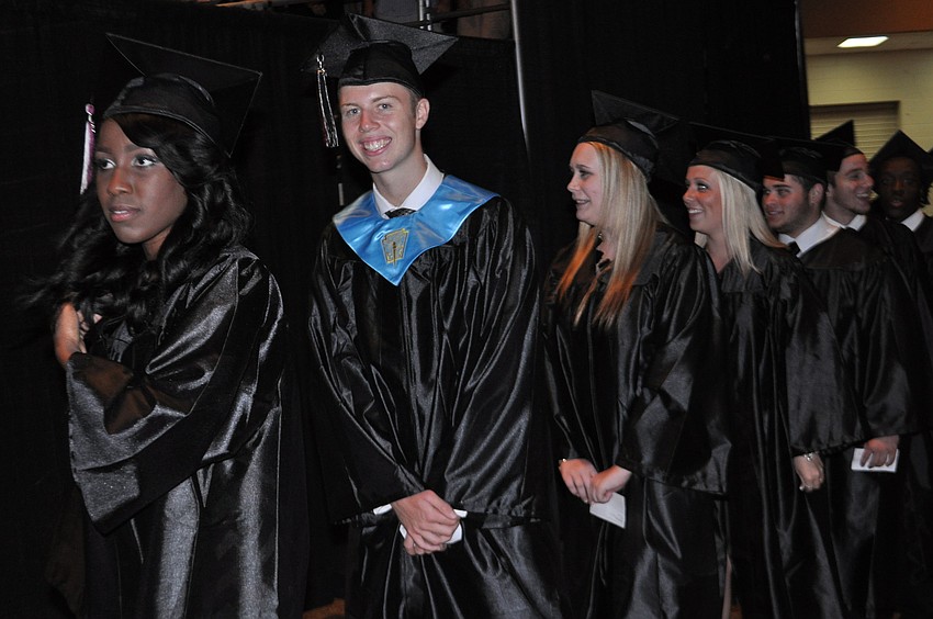 Jared Bieber  accepts his diploma.