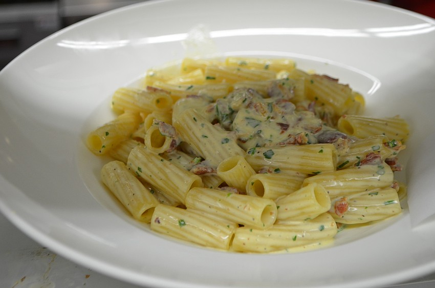Rigatoni Carbonara with creamy egg yolk, pancetta and parmesan sauce