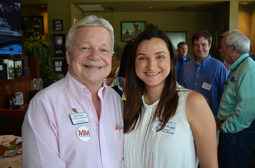 Paul Erickson and Jessica Bringas make new contacts during the event.