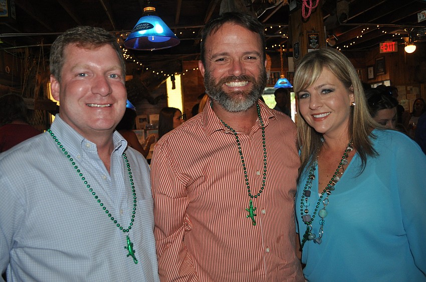 Dean Shaver, Nick Leduc, a fourth grade teacher at Braden River, and Melissa Ebling