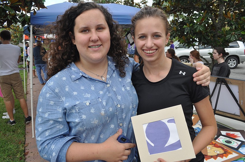 Sophomore Faith Martel with Jennifer Gaffers, a freshman who created an octopus design.