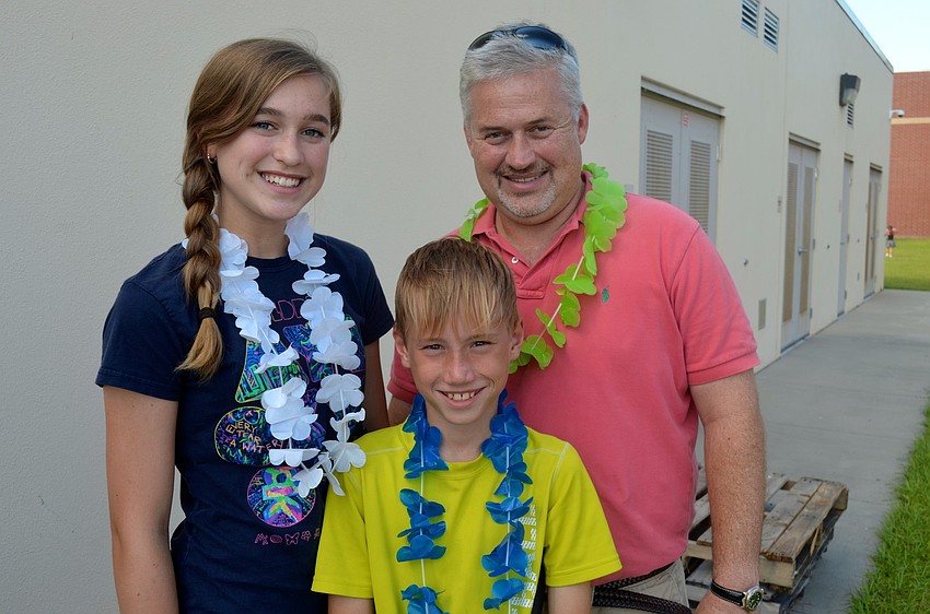 The Kreiling family â€” Courtney, Rob and Alex.