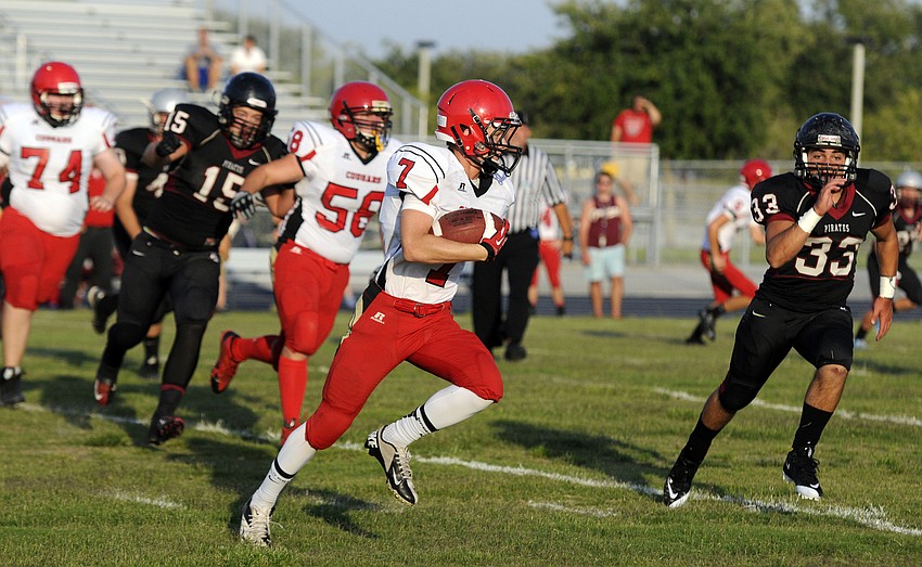 Cardinal Mooney running back Alex Sobczak carries the ball in the first quarter.