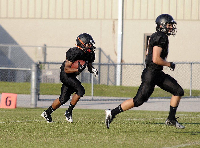Freshman Jaâ€™quan Johnson returns the opening kickoff during Sarasotaâ€™s spring game versus St. Petersburg.