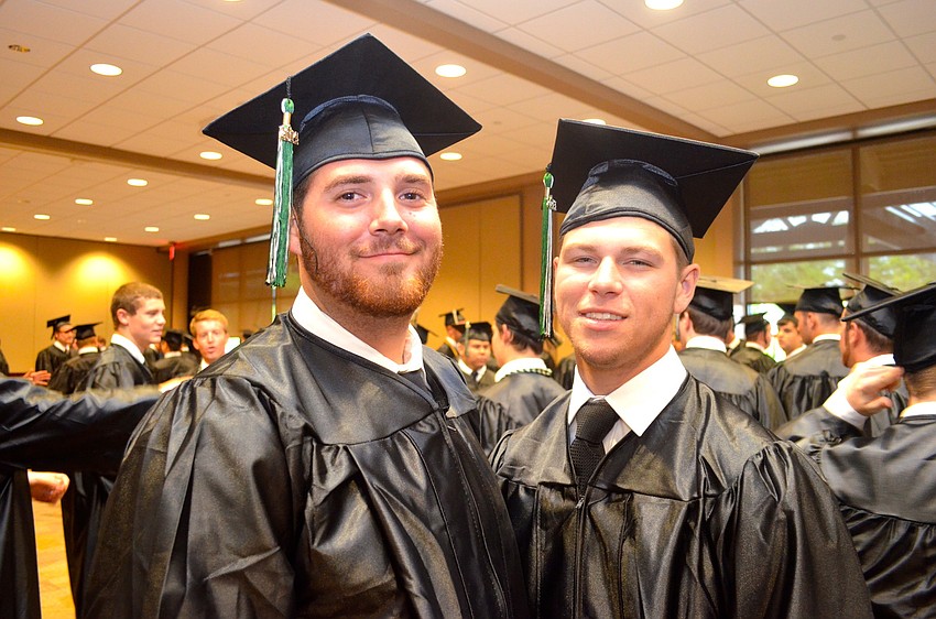 Jorge Corbitt and Alec Davis joke around before the ceremony starts.