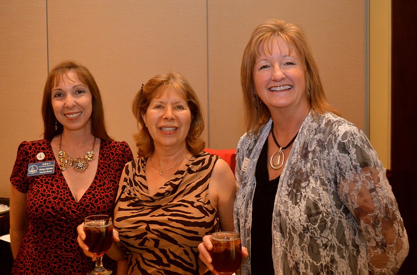 Robyn Spirtas, Joyce Fox and Karen Conkel socialize before lunch.