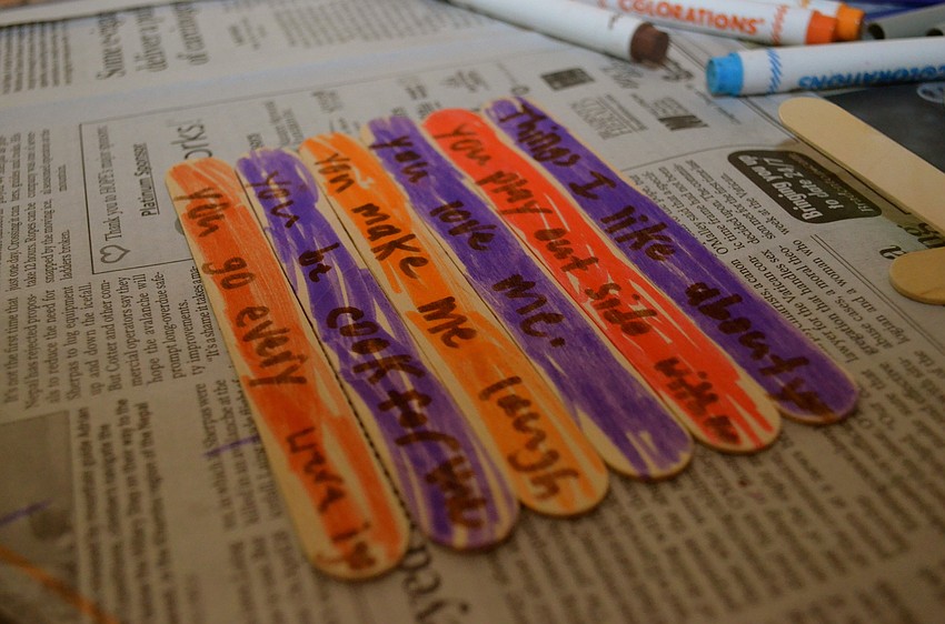 Students in second- through fifth-grades write reasons why they love their fathers.