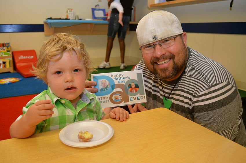 Archer Miles and his father, Rodney.