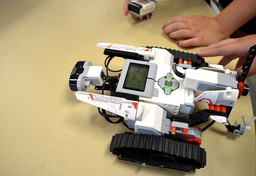 Students built Lego robots, which can be controlled by a remote or an app, during the camp.