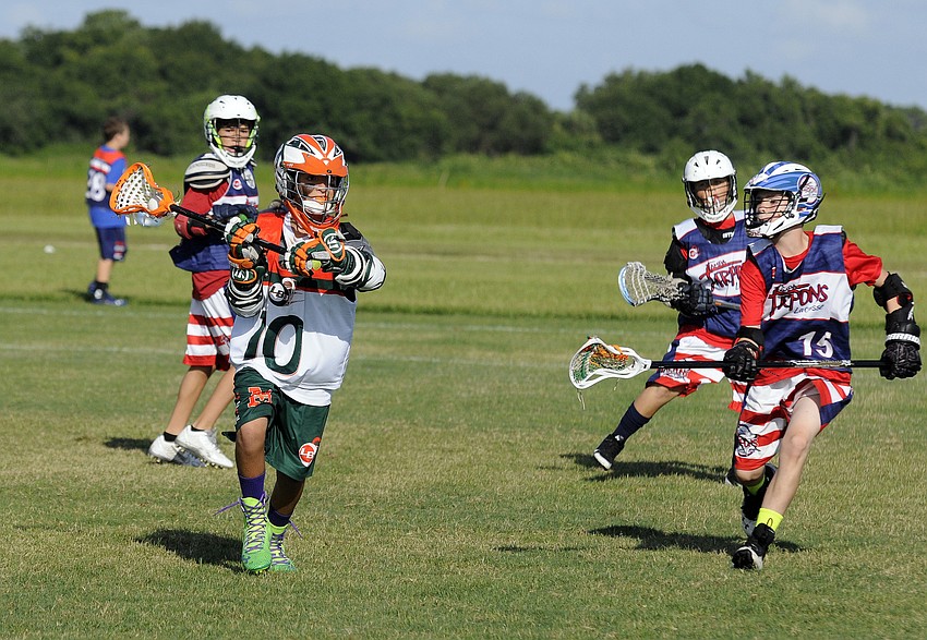 LB3 Monsters U11A midfielder Stephen Markowski looks to pass the ball to an open teammate during his teamâ€™s tournament opener June 21.