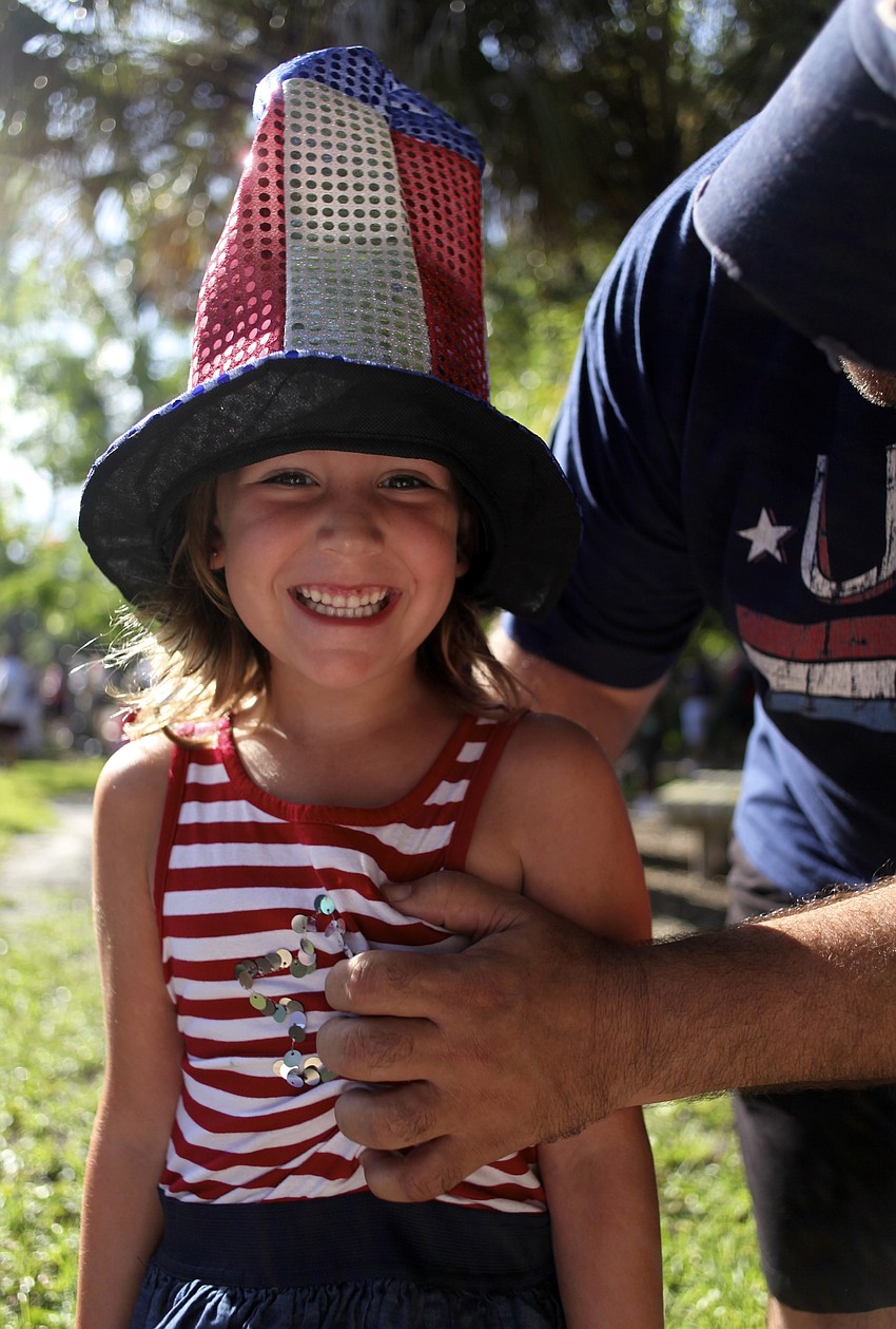 Grace Gerling, 5, laughs as her dad tickles her.
