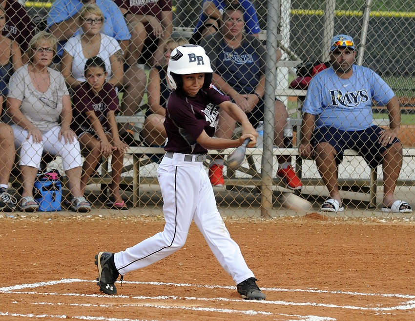 Braden River Intermediate All-Star Devin Guzman makes contact during the district championship versus Manatee West.