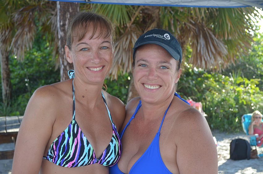 Shannon Deter and Kris Haas relax after setting up their spot.