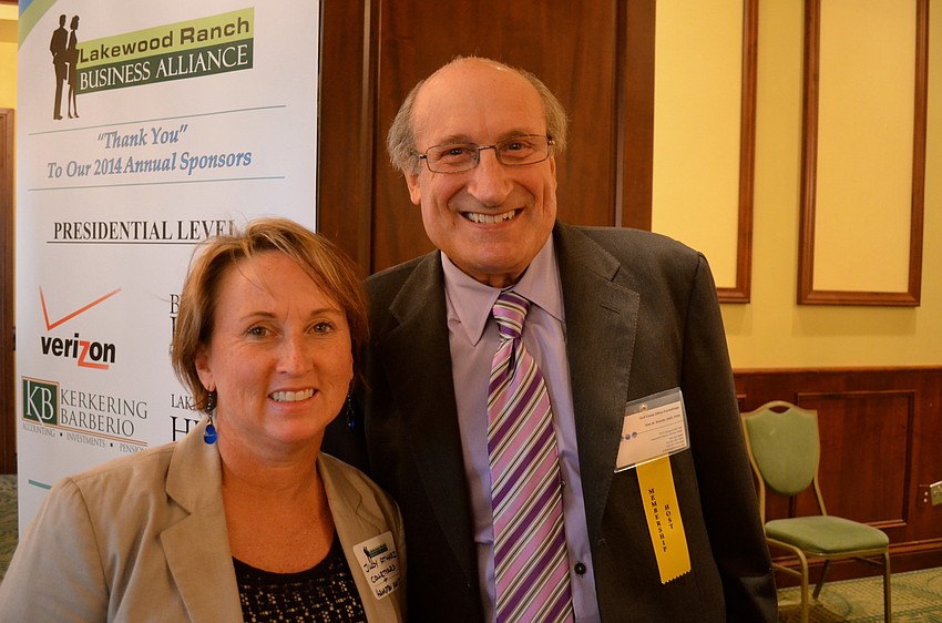 Judy Athari and Allan Shaivitz make small talk.