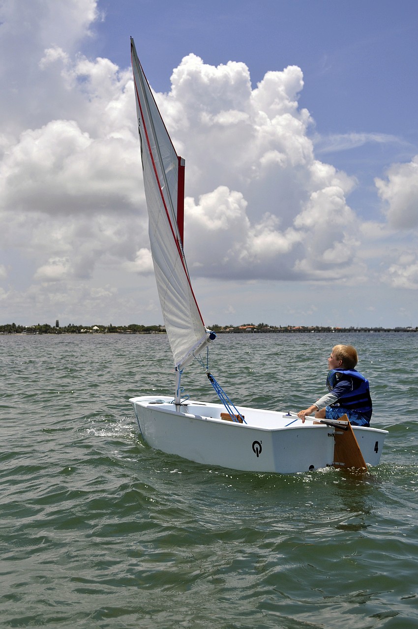 Sarasota Youth Sailing Programâ€™s summer sailing camp students sail optiâ€™s through Sarasota Bay.