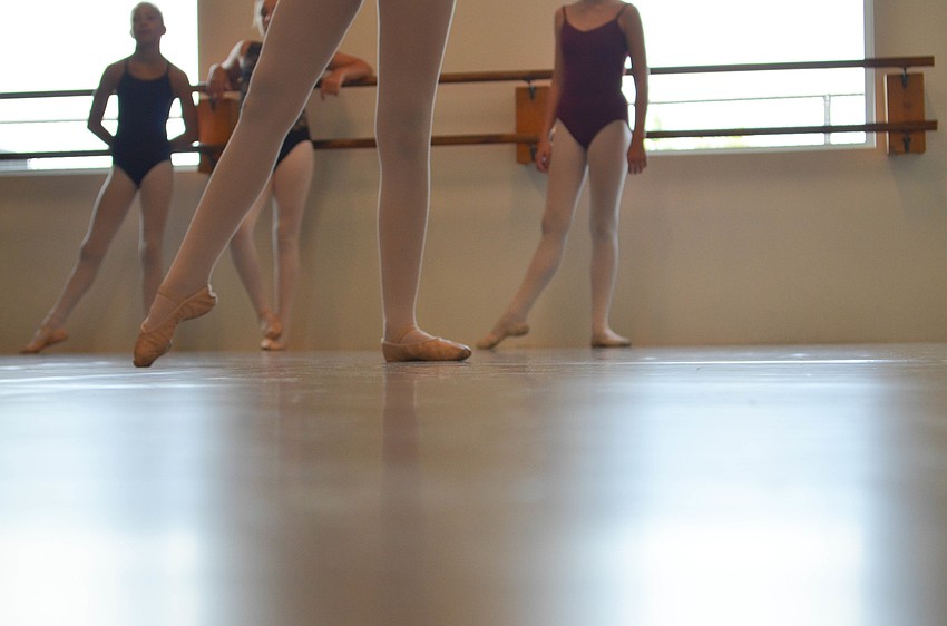 Katelyn Egan works on her dance positions