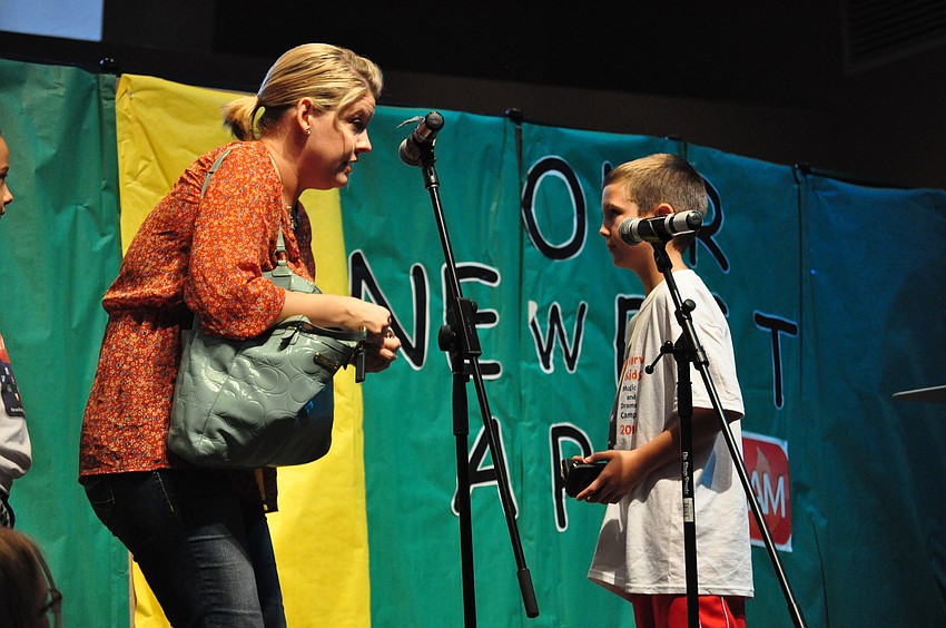 Allison Merriott, a mother, sends off Jaeden Halas to the app factory.