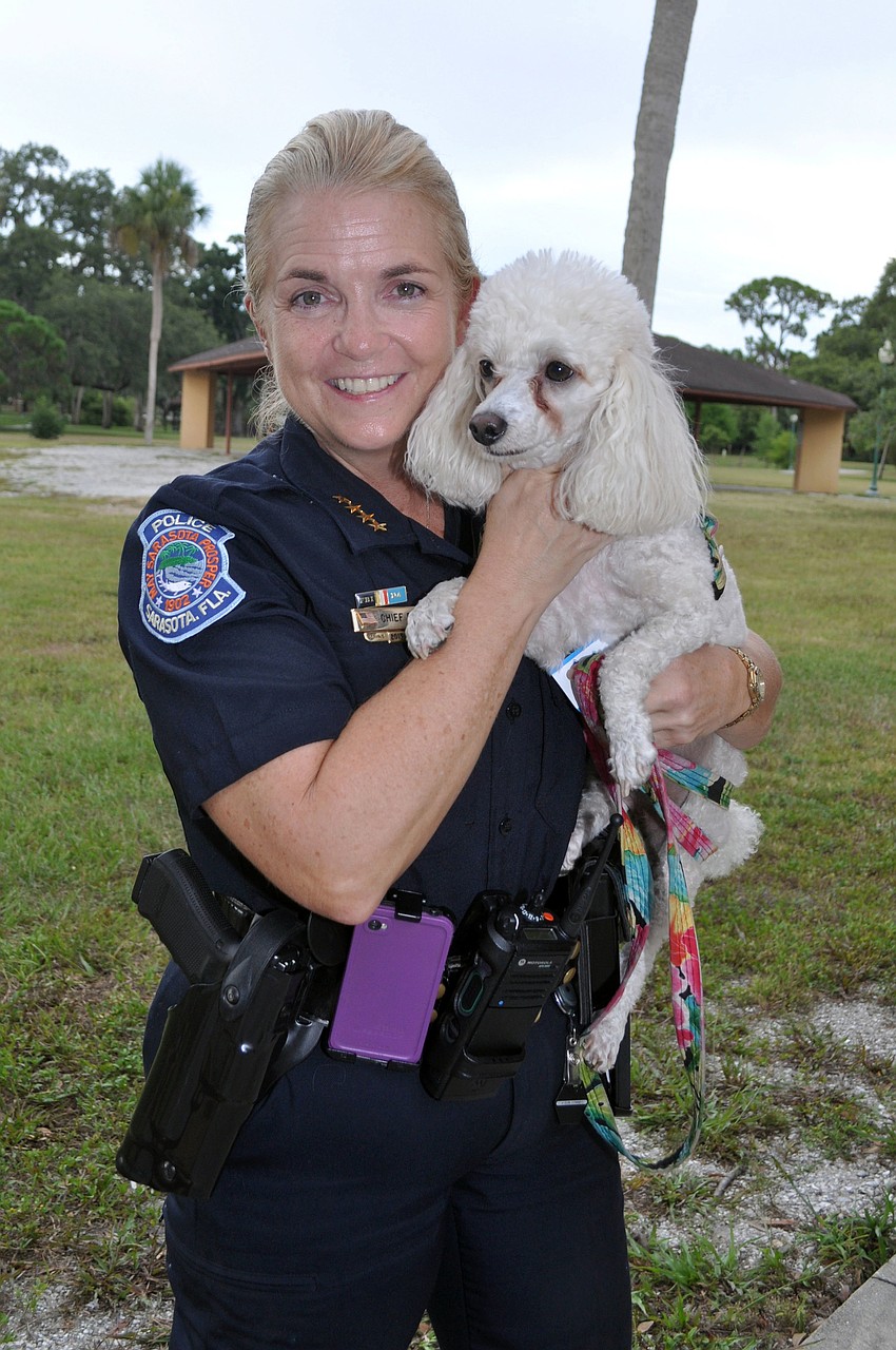 Chief of Police Bernadette DiPino with her poodle SeaSea