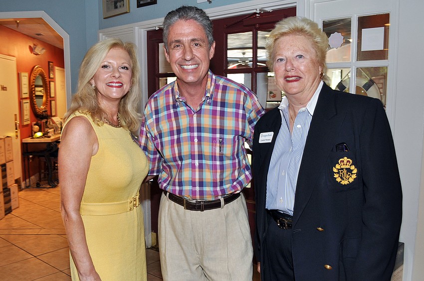 ulie Riddell, host and The Lazy Lobster of Longboat owner Michael Garey and Lynette Warnars