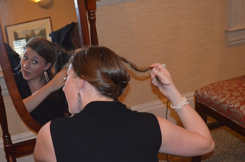 Jessica Hollick primps before her performance.