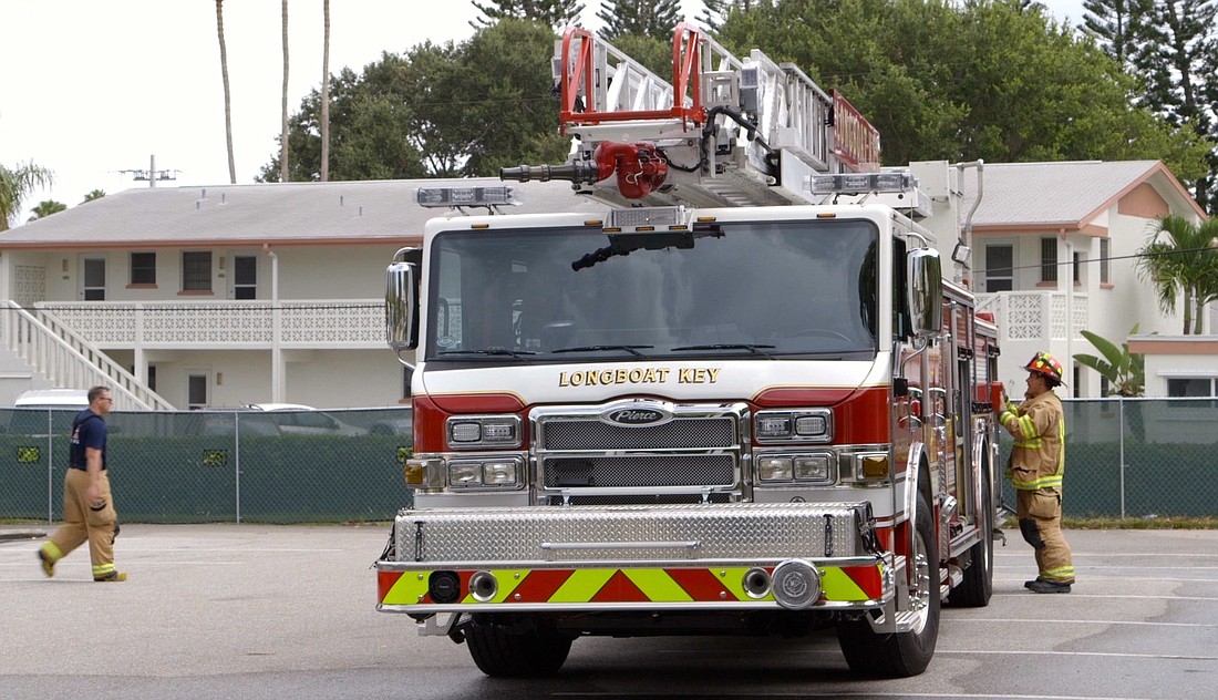 Longboat Key Fire-Rescue trucks begin practice drill Friday outside the former Longboat Key Hilton.