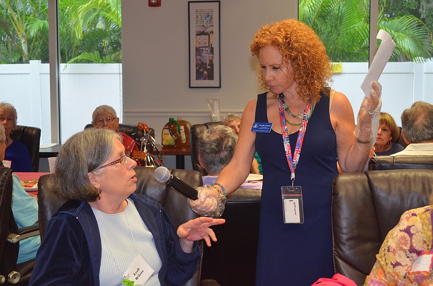 During lunch attendees shared historical moments from 1914, the year Carson was born. Leah Wilcox tells Amanda Cattaneo about passenger pigeons.