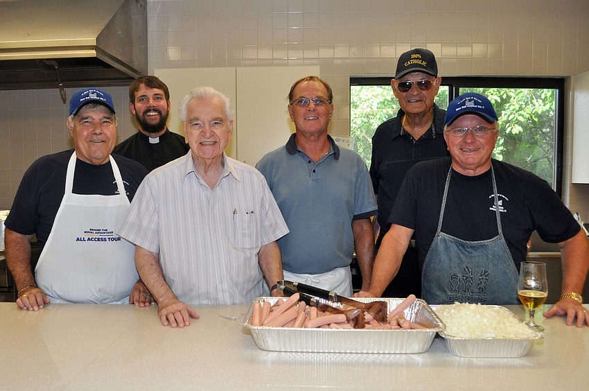 Joe Zanpino, Fr. Eric Scanlan, Frank Cerullo, Jim McGuire, Fr. Edward Pick and St. Mary Star of the Seaâ€™s Menâ€™s Club president Dave Carter