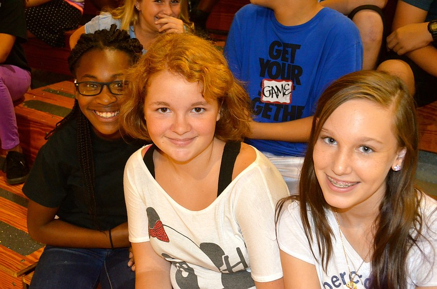 Ajanique Jones, Emma Buckwalter and Kate Chicca enjoy the Renaissance Celebration.