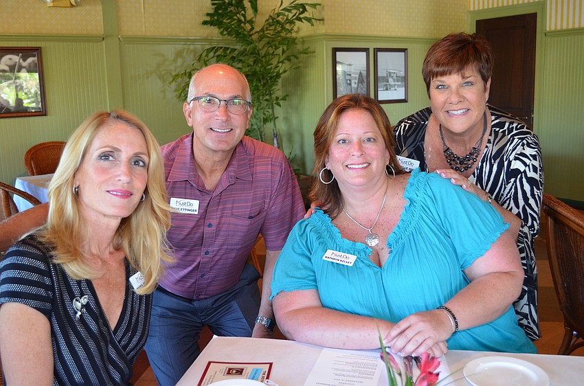 Nina Ettinger, Dave Ettinger, Kathryn Kelley and Michelle Dull from Must Do Visitor Guide.