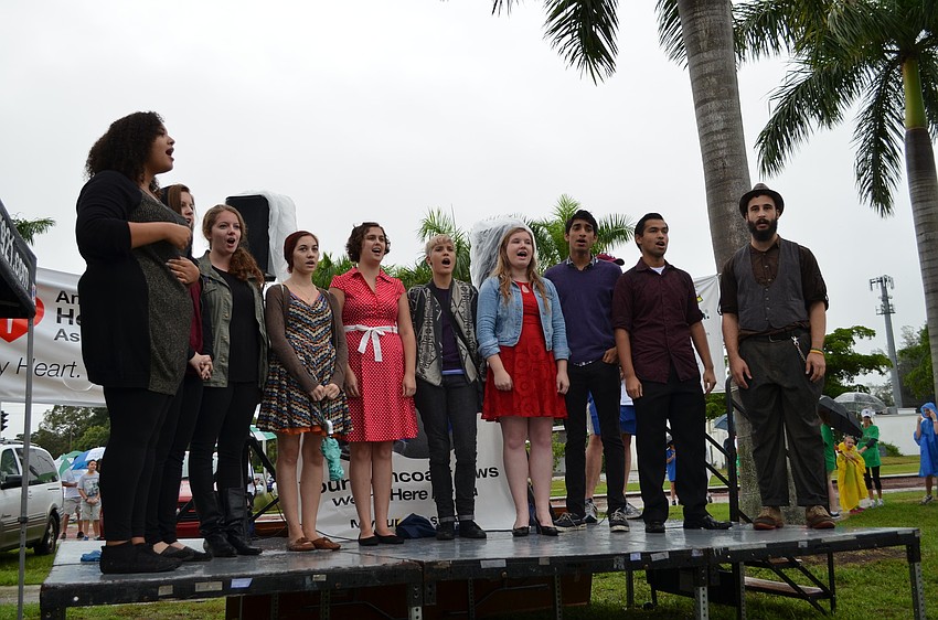 The Ringling College Music Minor a cappella group performs the national anthem before the start of the Heart Walk.