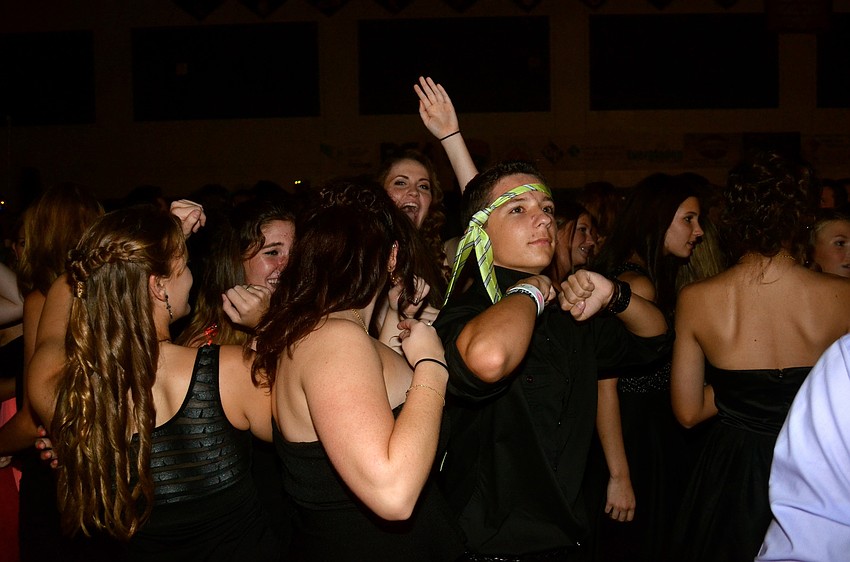 Tommy Finnan gets in the middle of a girls-only dance circle.