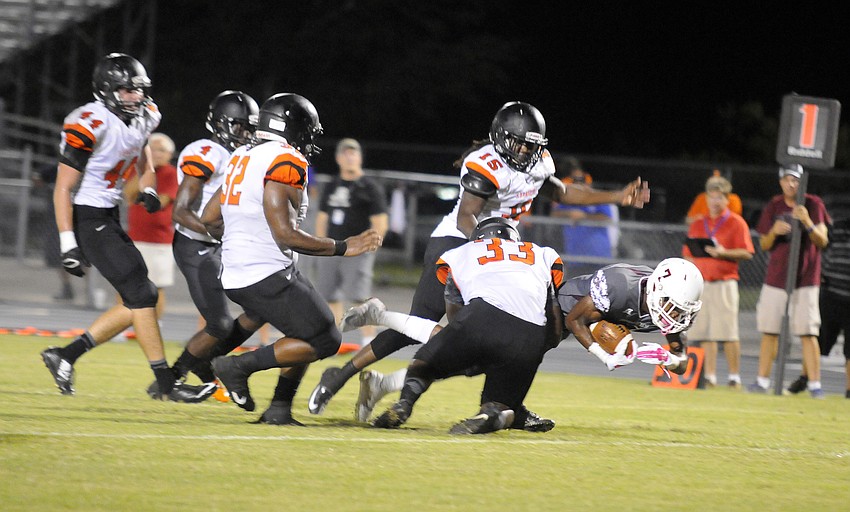 Braden River senior wide receiver Justin Ross lunges for the end zone for his second touchdown of the game.