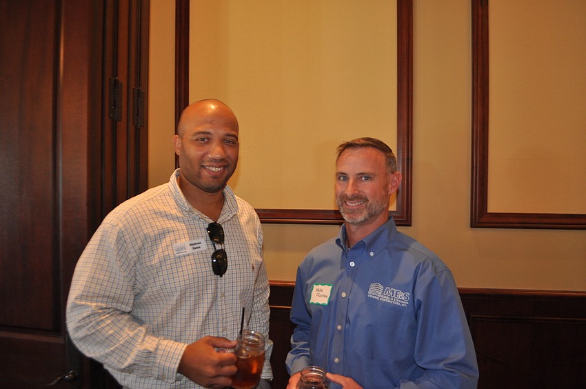 Matthew Bates of Suncoast News Network with Mark Freeman of McIntyre Elwell & Strammer