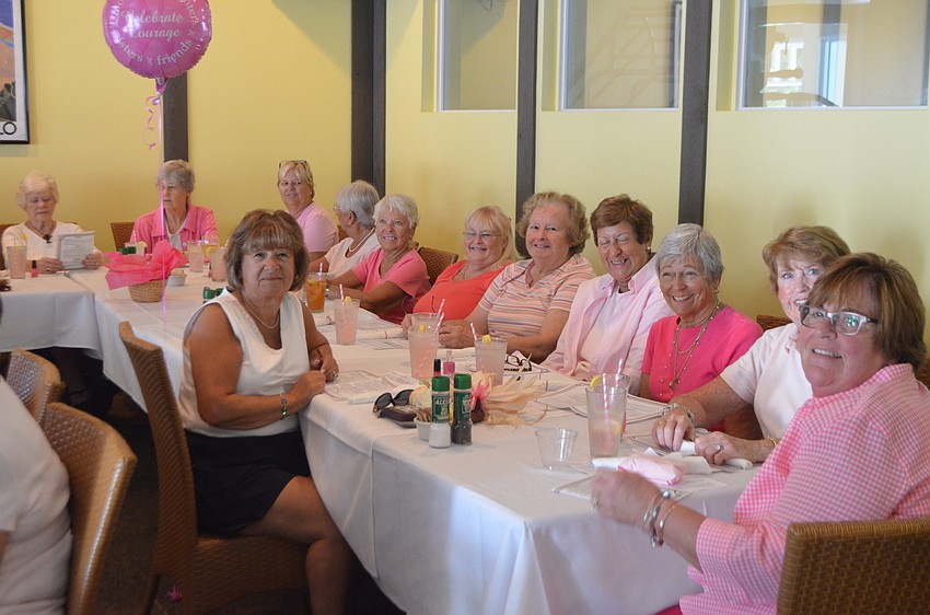 25 women gather at the event to recognize Breast Cancer Awareness Month