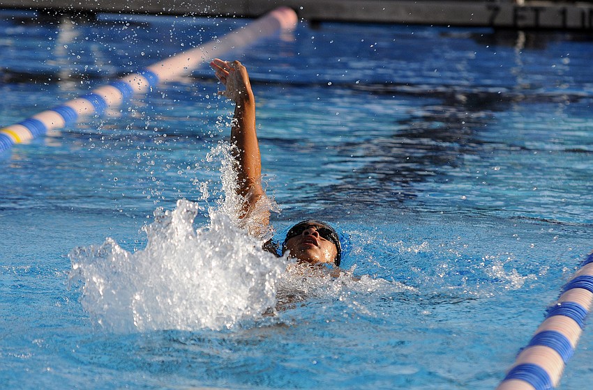 Riverview freshman Benjamin Lu swims the backstroke during the 200-yard individual medley.