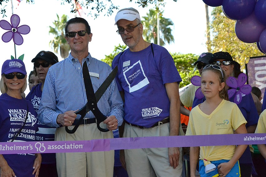 Alzheimerâ€™s Association Florida Gulf Coast Chapter members of the Board of Directors, Tom Conklin and David Gollins anticipate the start of the walk.