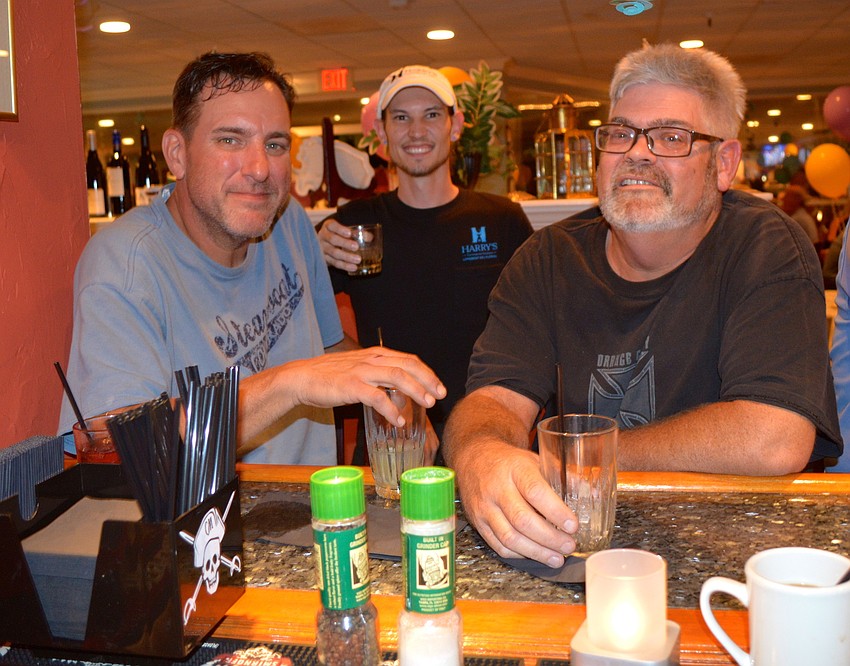 Brian Frient, Brian Forbes and Brock Rigel, from Harry's Corner Store.